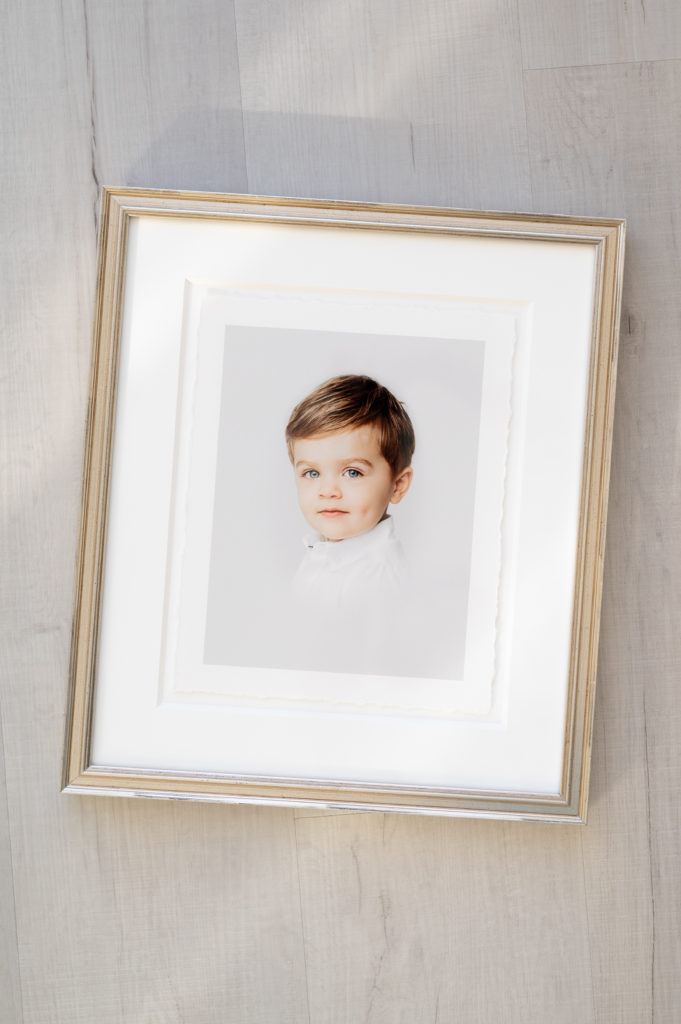 Framed deckled print of heirloom portrait taken at the Worth Capturing photography studio in Raleigh NC.