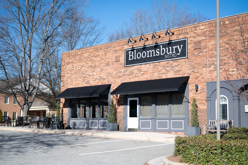 Storefront of Bloomsbury BIstro in the Five Points neighborhood of Raleigh, North Carolina.